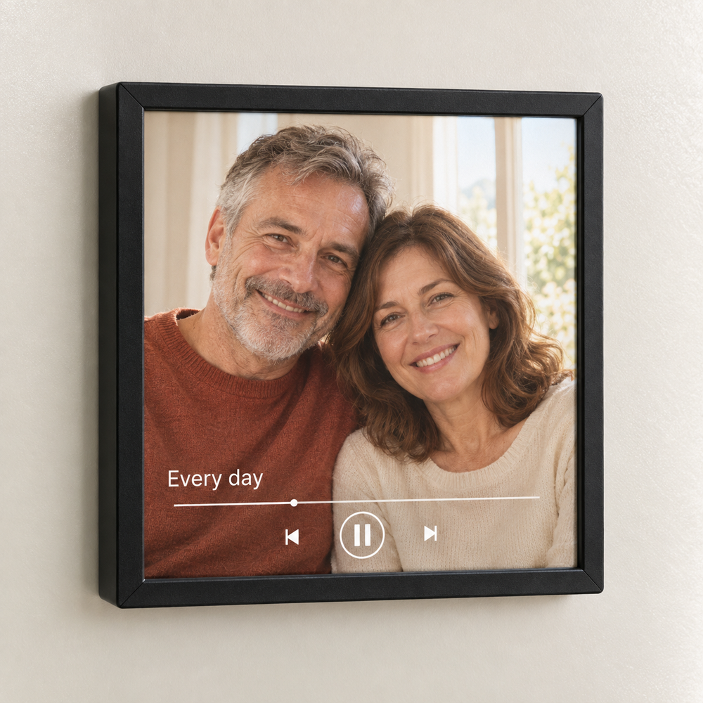 Black framed music fridge magnet with a smiling mature couple, Every day caption and printed white music graphics.