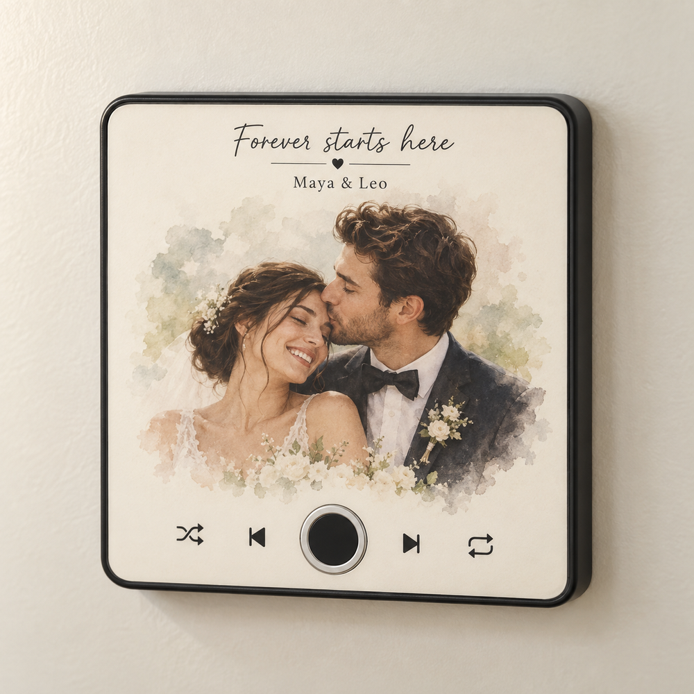 Black music fridge magnet with a watercolor wedding portrait, Maya and Leo names and a silver-ring button.