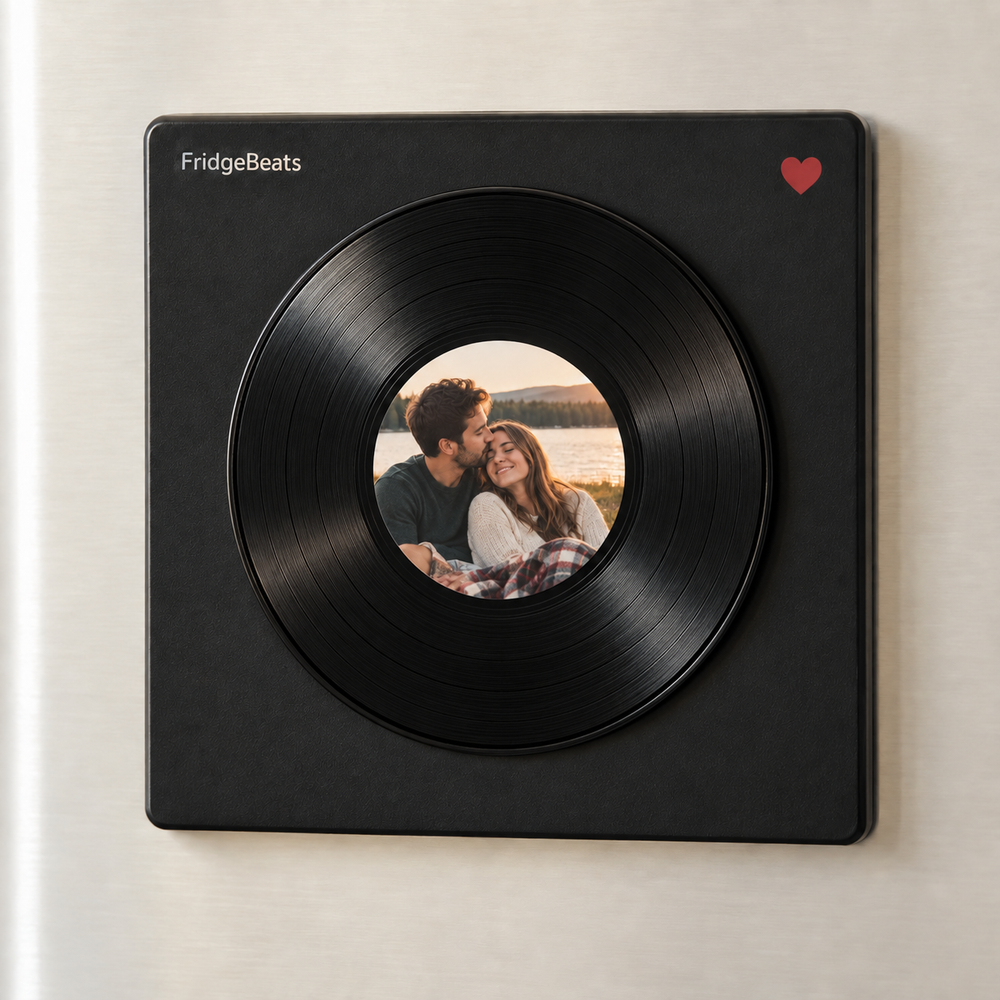 Black square vinyl music fridge magnet with a grooved disc and an uninterrupted circular couple photo.