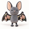 Personalised grey bat plush with two full-colour couple photos on the wings and peach inner ears, on a white background