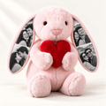 Pink photo bunny — 4 photo ears with red plush heart. New Levida studio main image; example personalization.
