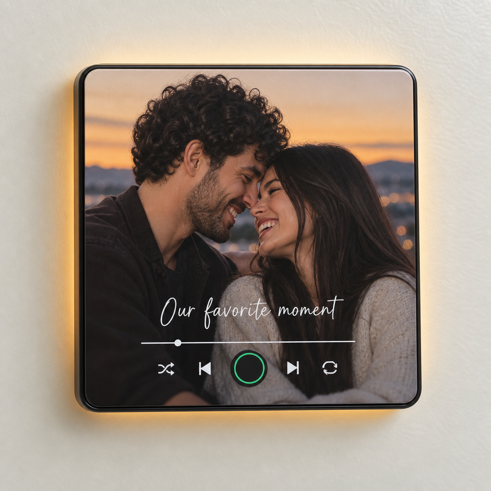 Black photo music fridge magnet with a new smiling couple, warm rear night light and a blank green-ringed control.