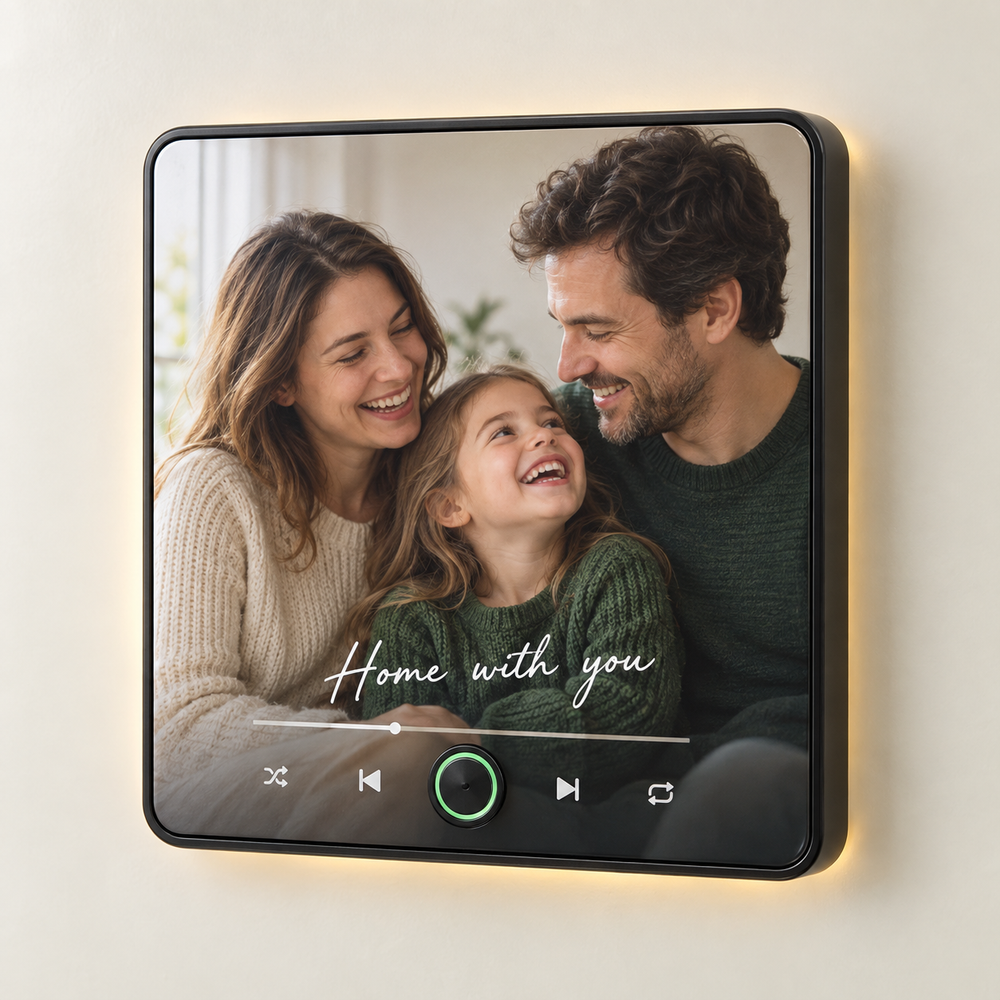 Black framed family photo music fridge magnet with warm rear light and blank green-ringed button.