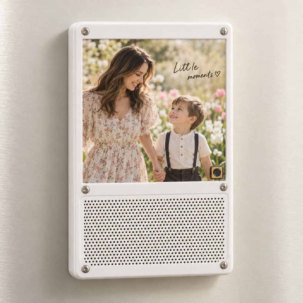 White rectangular photo music speaker fridge magnet with a mother and child photograph, six screws and white perforated grille.