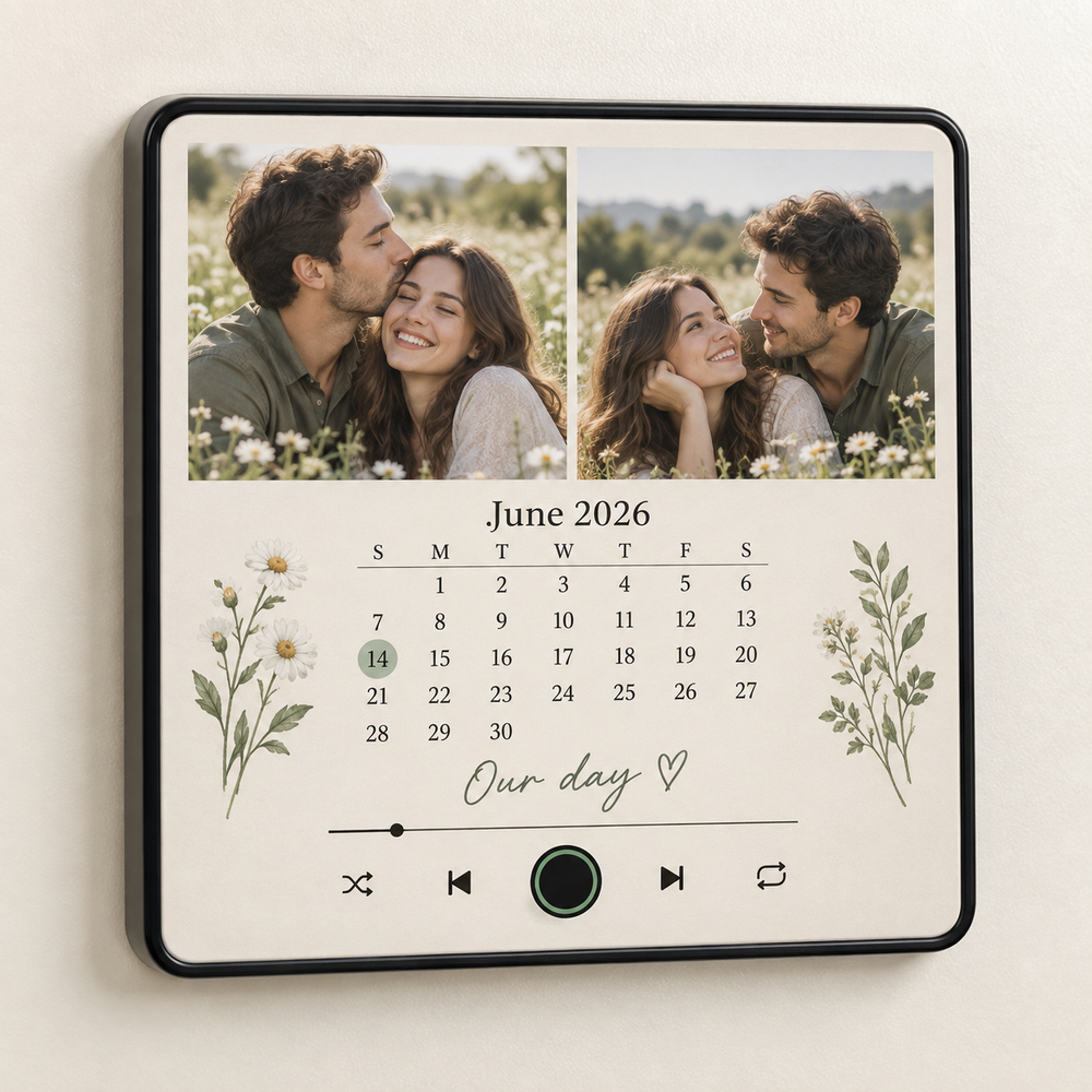 Black framed personalized photo calendar music fridge magnet for June 2026 with two couple photos and blank green-ringed control.