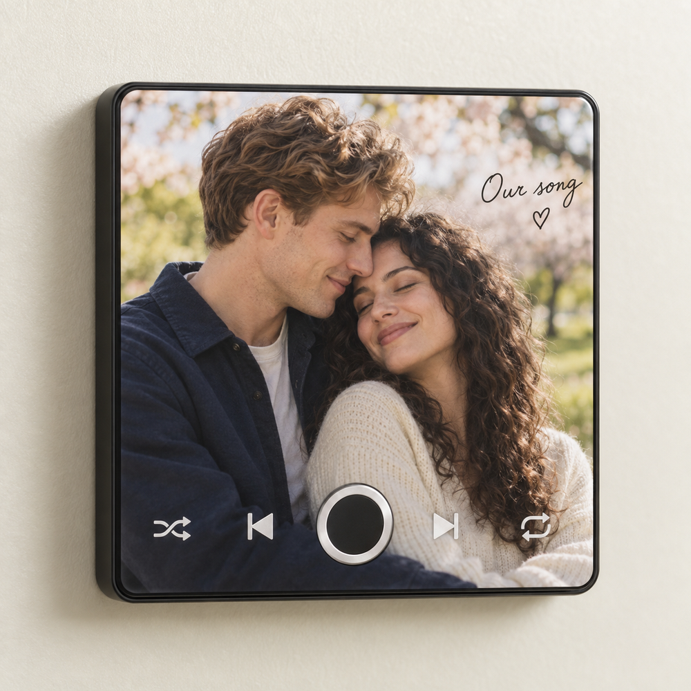 Black music fridge magnet with a spring couple photo, Our song caption and silver-ring button.